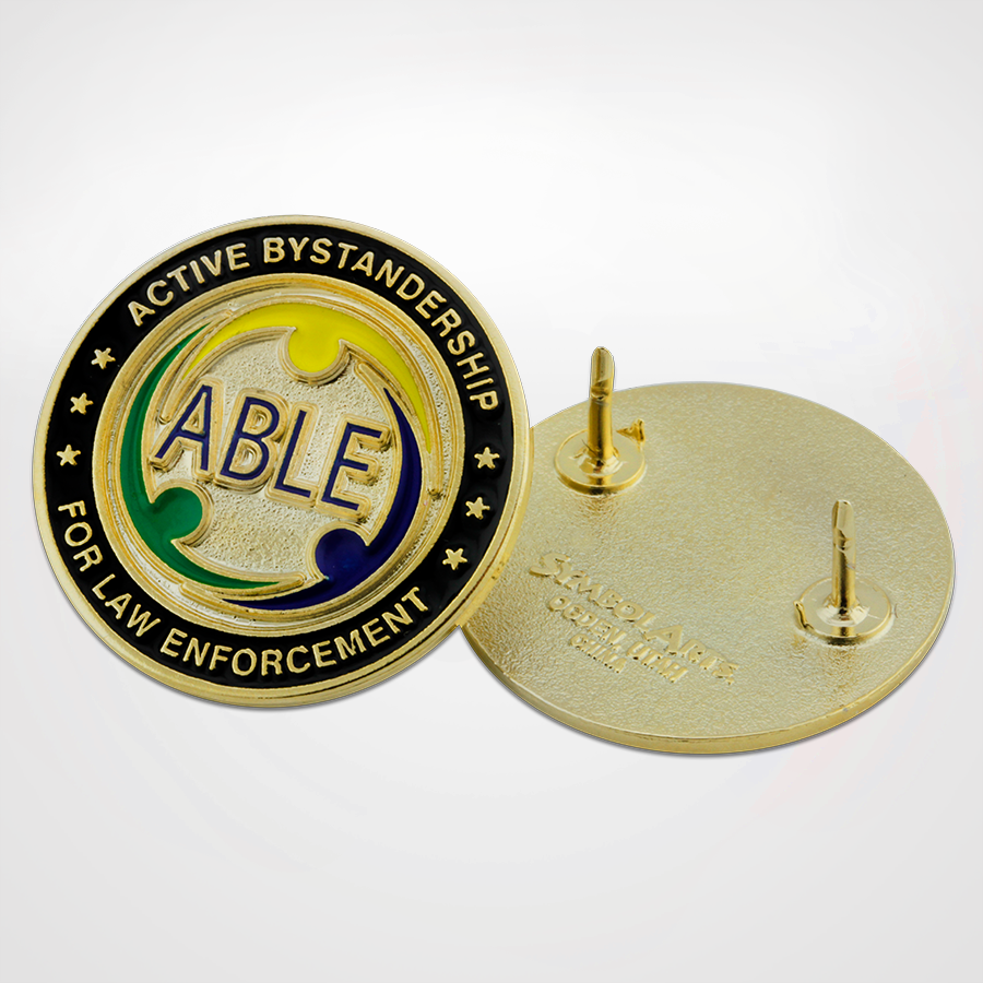 ABLE pin with logo and back view of pin